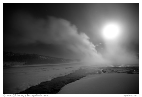Run-off and geyser, steam obscuring moon, Old Faithful. Yellowstone National Park (black and white)