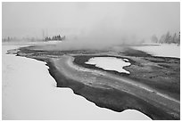 Mirror Pool, snow and steam. Yellowstone National Park, Wyoming, USA. (black and white)