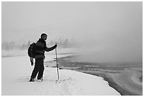 Skier at the edge of thermal pool. Yellowstone National Park ( black and white)