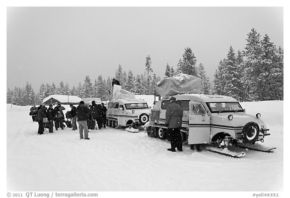 Winter tour snow coaches unloading, Flagg Ranch. Yellowstone National Park, Wyoming, USA.