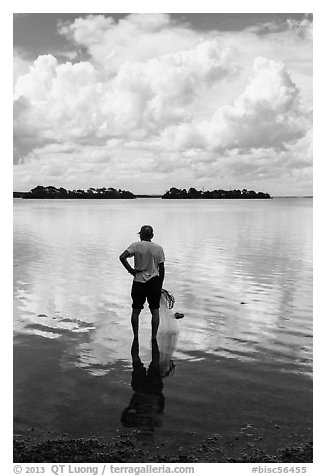 Fisherman holding net. Biscayne National Park, Florida, USA.