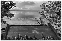 Miami in the distance and interpretive sign. Biscayne National Park, Florida, USA. (black and white)