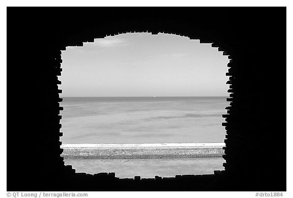 Turquoise waters framed by a cannon embrasure in Fort Jefferson. Dry Tortugas National Park (black and white)