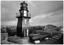 Lighthouse and cannon on upper level of Fort Jefferson. Dry Tortugas  National Park ( black and white)