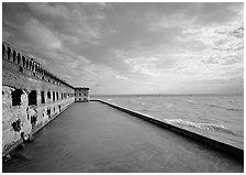 Fort Jefferson wall, moat and seawall, brighter late afternoon light. Dry Tortugas National Park ( black and white)