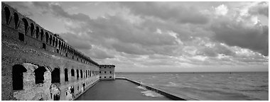 Ruined masonery wall overlooking Carribean waters. Dry Tortugas National Park (Panoramic black and white)