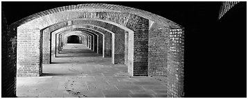 Arches in Fort Jefferson lower level. Dry Tortugas National Park (Panoramic black and white)