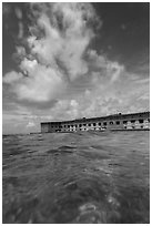 Fort Jefferson see at water level. Dry Tortugas National Park, Florida, USA. (black and white)