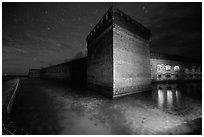 Fort Jefferson corner turret and moat at night. Dry Tortugas National Park ( black and white)