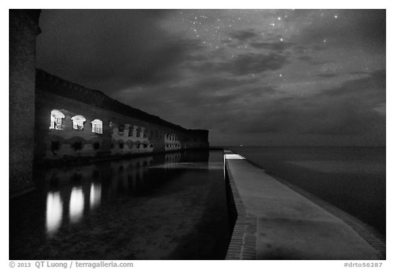 Fort Jefferson, moat, and ocean at night. Dry Tortugas National Park (black and white)