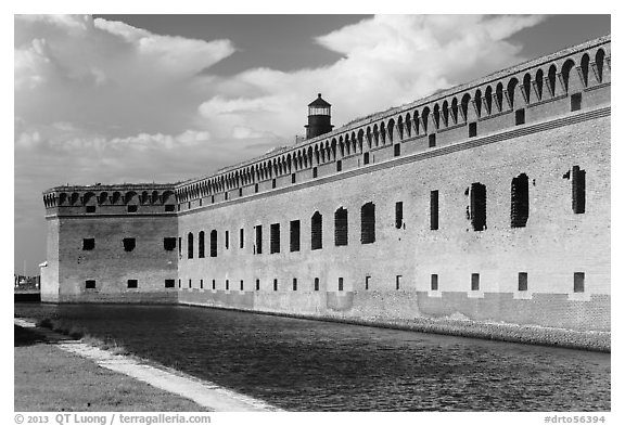 Moat, wall, and Harbor Light. Dry Tortugas National Park, Florida, USA.