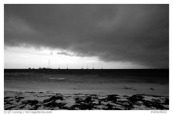 Approaching storm over Yachts at Tortugas anchorage. Dry Tortugas National Park, Florida, USA.