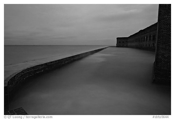 Seawall at dusk during  storm. Dry Tortugas National Park (black and white)