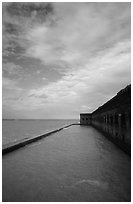 Sky, seawall and moat on windy day. Dry Tortugas National Park, Florida, USA. (black and white)