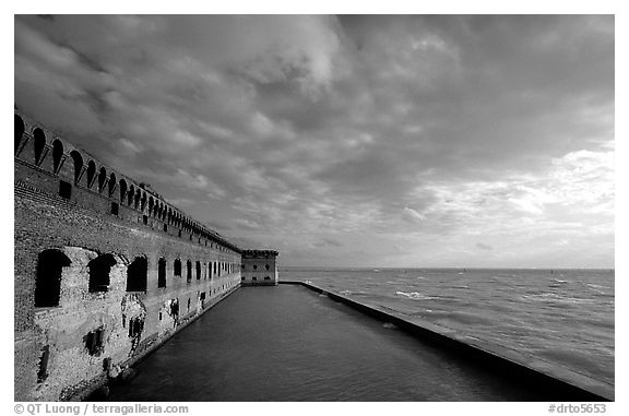 Fort Jefferson seawall and moat, late afternoon. Dry Tortugas National Park, Florida, USA.