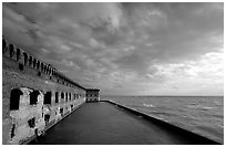 Fort Jefferson seawall and moat, late afternoon. Dry Tortugas National Park, Florida, USA. (black and white)