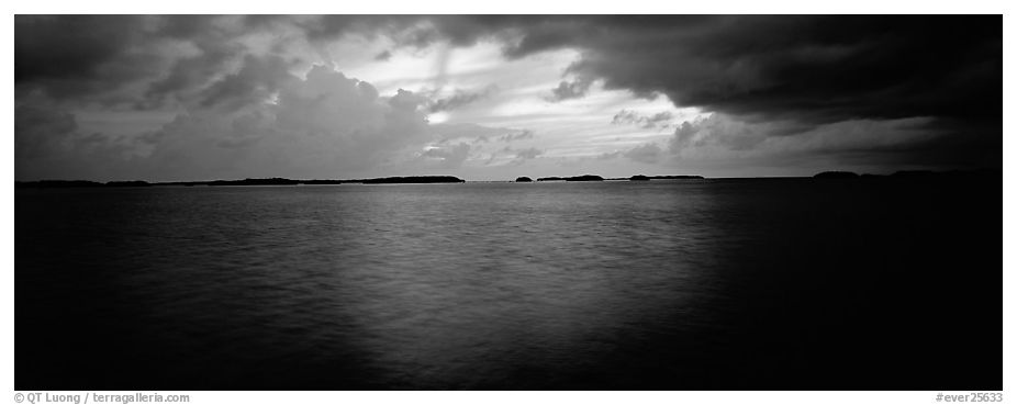 Stormy sunset over bay with low islets in background. Everglades National Park (black and white)