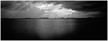 Stormy sunset over bay with low islets in background. Everglades  National Park (Panoramic black and white)