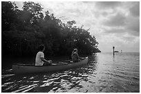 Couple canoeing towards Florida Bay. Everglades National Park ( black and white)