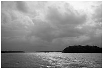 Storm clouds and canoe, Florida Bay. Everglades National Park ( black and white)