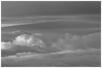 Mauna Loa between clouds, seen from Halekala summit. Haleakala National Park ( black and white)