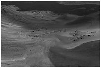 Red Cinder flow and green vegetated ridge in Haleakala Crater. Haleakala National Park, Hawaii, USA. (black and white)