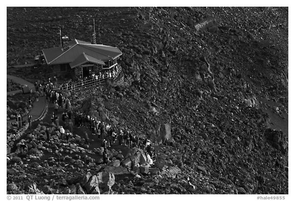 Visitor center and sunrise watchers at dawn. Haleakala National Park, Hawaii, USA.