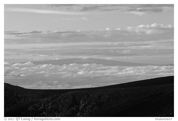 Mauna Loa framed by Haleakala Crater at sunrise. Haleakala National Park (black and white)