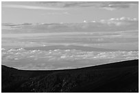 Mauna Loa framed by Haleakala Crater at sunrise. Haleakala National Park, Hawaii, USA. (black and white)