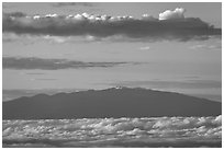 Mauna Kea and clouds at sunrise. Haleakala National Park, Hawaii, USA. (black and white)