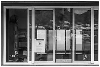 Parking lot and mountain, Kipahulu Visitor Center window reflexion. Haleakala National Park ( black and white)