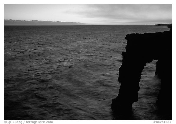 Holei sea arch at sunset. Hawaii Volcanoes National Park, Hawaii, USA.