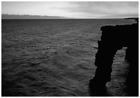 Holei sea arch at sunset. Hawaii Volcanoes National Park ( black and white)