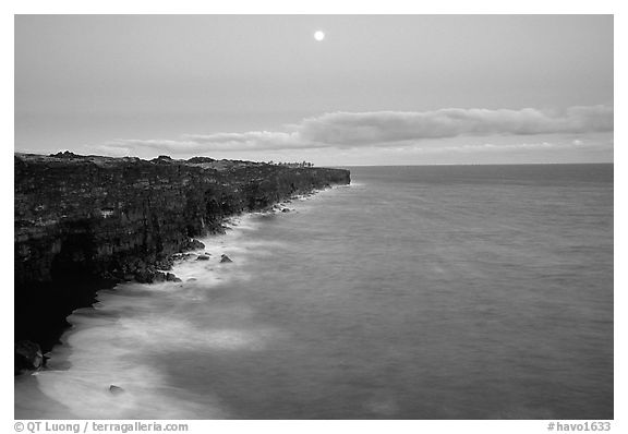 Holei Pali cliffs and moon at dusk. Hawaii Volcanoes National Park, Hawaii, USA.