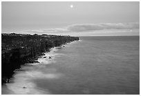 Holei Pali cliffs and moon at dusk. Hawaii Volcanoes National Park, Hawaii, USA. (black and white)