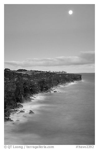 Holei Pali volcanic cliffs and moon at dusk. Hawaii Volcanoes National Park, Hawaii, USA.