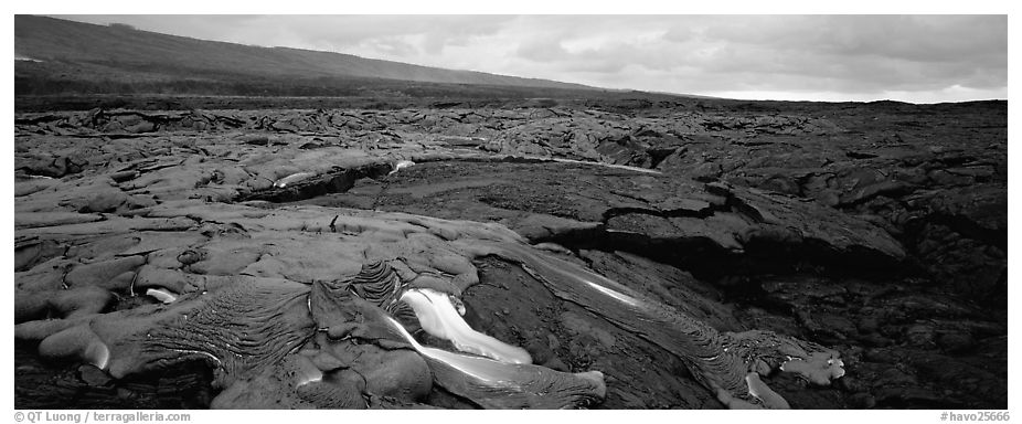 Volcanic landscape with molten lava low. Hawaii Volcanoes National Park (black and white)