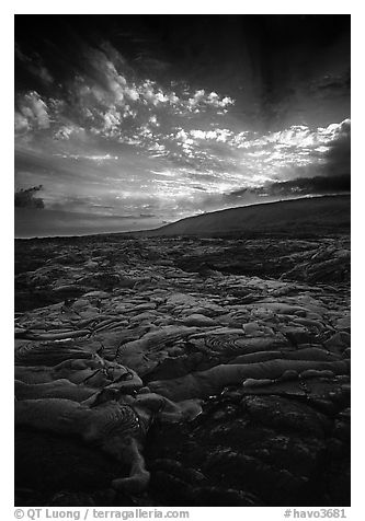 Live lava flow on coastal plain sunset. Hawaii Volcanoes National Park (black and white)