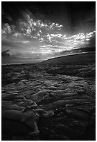 Live lava flow on coastal plain sunset. Hawaii Volcanoes National Park, Hawaii, USA. (black and white)