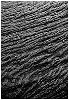 Ripples of flowing pahoehoe lava detail. Hawaii Volcanoes National Park, Hawaii, USA. (black and white)