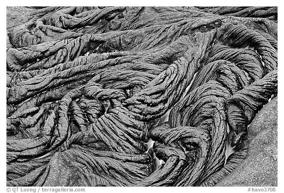 Braids of pahoehoe lava with red hot lava showing through cracks. Hawaii Volcanoes National Park (black and white)