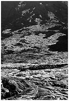 Volcanic landform of recently hardened lava flow at  base of Holei Pali. Hawaii Volcanoes National Park ( black and white)