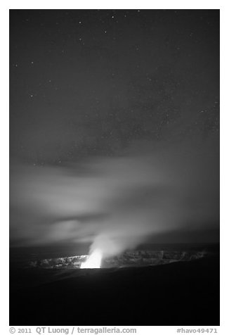 Glow from molten lava illuminates night sky, Kilauea volcano. Hawaii Volcanoes National Park (black and white)