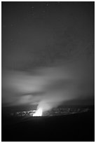 Glow from molten lava illuminates night sky, Kilauea volcano. Hawaii Volcanoes National Park, Hawaii, USA. (black and white)