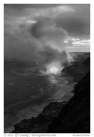 Coastline with steam illuminated by molten lava. Hawaii Volcanoes National Park (black and white)