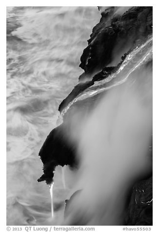 Ribbons of lava flow into the Pacific Ocean. Hawaii Volcanoes National Park, Hawaii, USA.