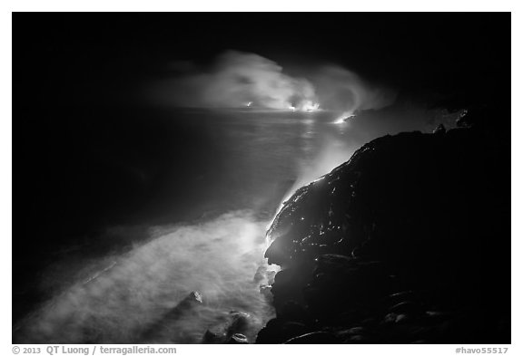 Streams of lava flow into Pacific Ocean. Hawaii Volcanoes National Park, Hawaii, USA.