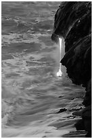 Lava spigot at dawn. Hawaii Volcanoes National Park, Hawaii, USA. (black and white)