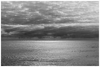 Silvery ocean and clouds, early morning. Hawaii Volcanoes National Park, Hawaii, USA. (black and white)