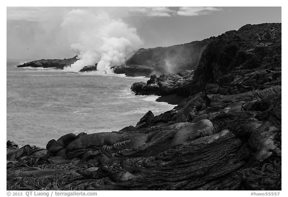 Molten lava flow and ocean plume. Hawaii Volcanoes National Park, Hawaii, USA.